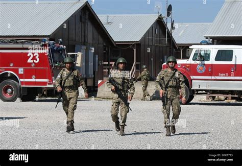 Soldiers From The Turkish Land Forces Stationed At Camp Bondsteel Close