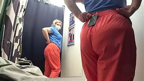 The Camera In The Fitting Room Watches A Big Butt In White Panties Curvy MILF Tries On Pants