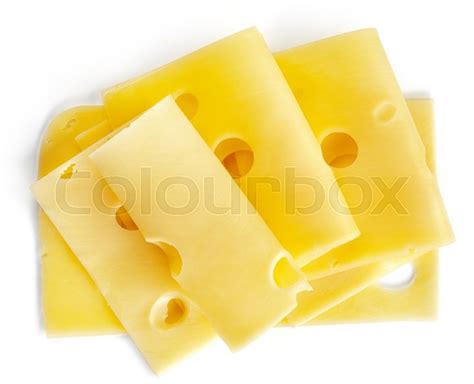 Cheese slices isolated on white ... | Stock image | Colourbox