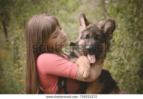 Happy Young Woman Hugs Beautiful Fluffy Stock Photo 718312273