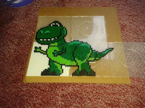 Rex - toy story | Perler bead art, Melty bead designs, Perler bead disney