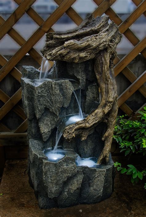 Jeco Inc Resin Fiberglass Tree Trunk And Rocks Fountain With Led Light