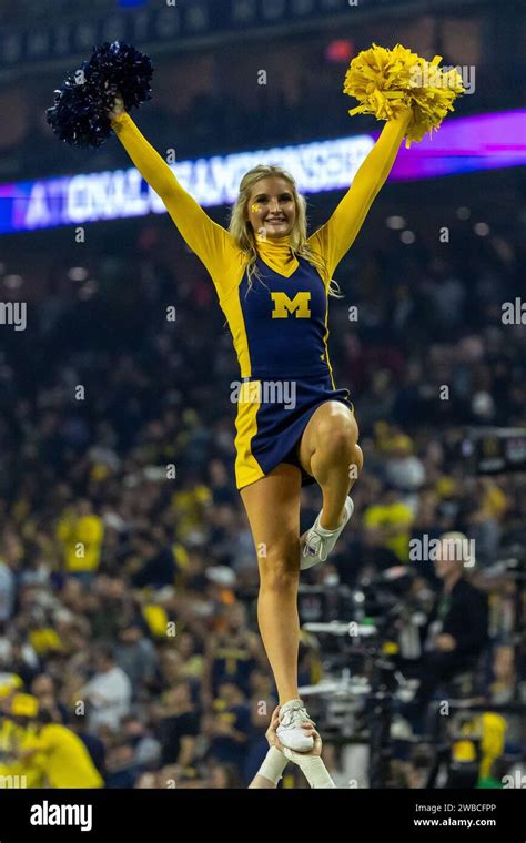 Michigan Wolverines Cheerleader Entertains The Crowd During The