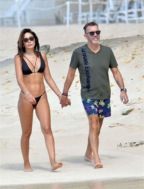 Nigora Bannatyne in Black Bikini on the beach in Barbados-18 | GotCeleb