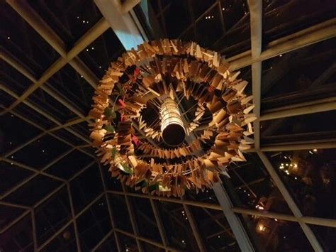 A Chandelier Hanging From The Ceiling In A Building