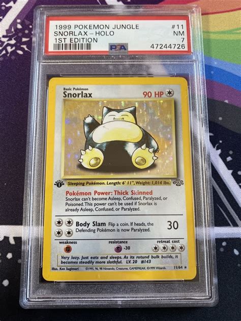 PSA 7 1st Edition Snorlax Holo Jungle Pokemon Card