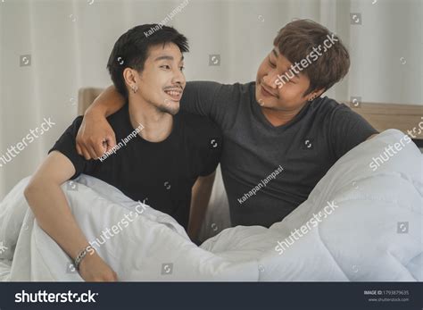 Happy Gay Couple Lying On Bed Stock Photo 1793879635 Shutterstock