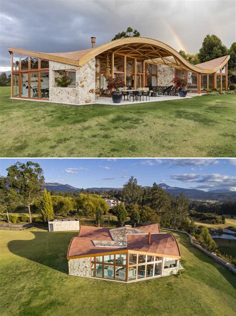 The Wavy Roof On This House Also Has An Exposed Wood Structure On The