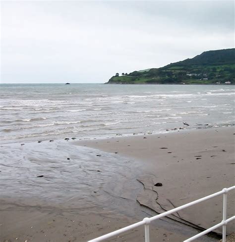 Stream discharging into Carnlough Bay Photo | UK Beach Guide