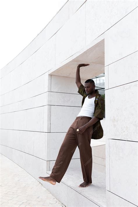 Free Photo | Portrait of man posing in traditional african attire outdoors