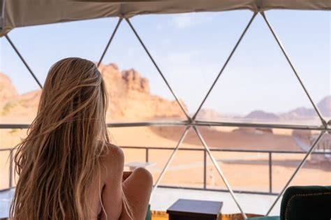 Premium Photo Naked Tourist Woman With Long Blonde Hair In Bubble Tent At Wadi Rum Protected