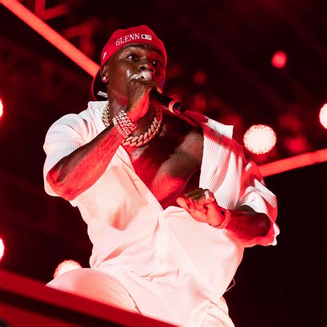 Download DaBaby posing confidently in a stylish outfit | Wallpapers.com