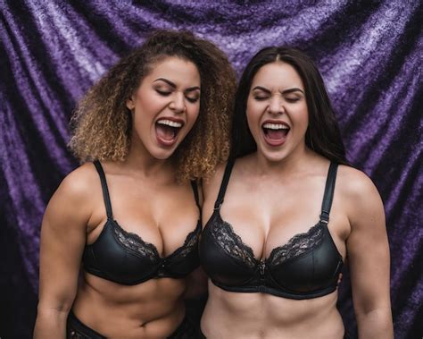 Premium Photo Two Women In Black Bras And Underwear Posing For The Camera