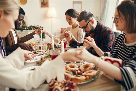 Saying Prayer At Dinner Stock Image Image Of Cafe Party 162881105