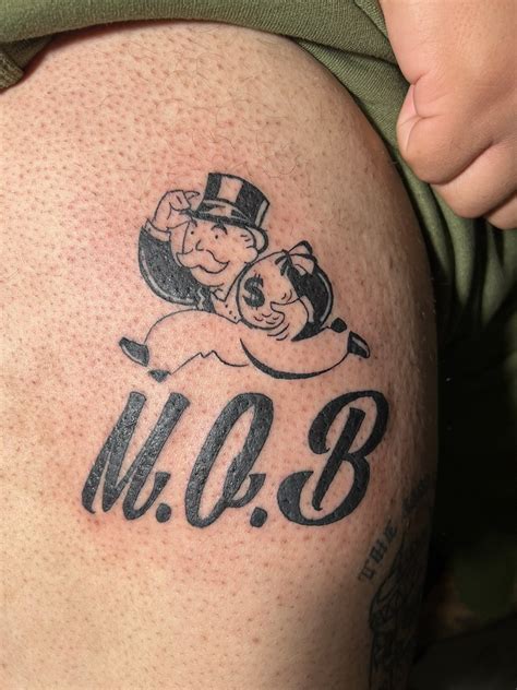 Meek Mill Monopoly Tattoo