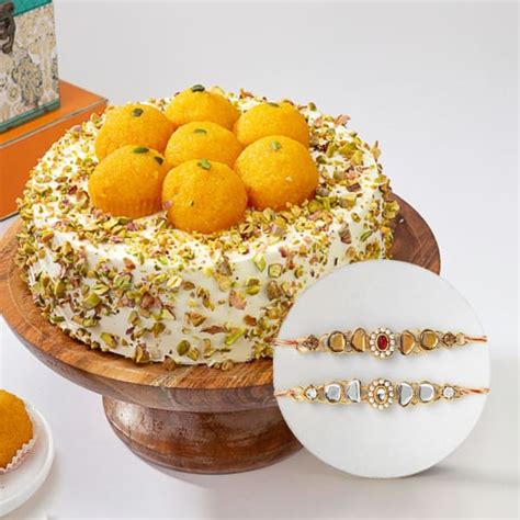 Buy Send Kundan And Pearl Rakhi Set Of With Motichoor Ladoo Cake