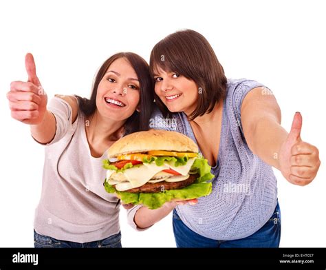 Women Eating Hamburger Stock Photo Alamy