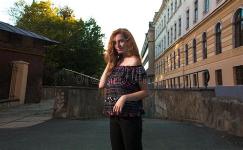 Attractive Red Haired Woman With Naked Shoulders Posing At The S Stock Image Image Of Hair