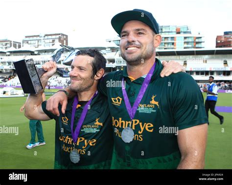 Nottinghamshire S Chris Read Left Celebrates With The Trophy During