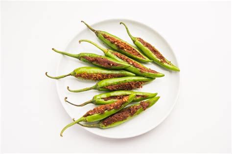 Premium Photo Bharwa Masala Mirch Or Stuffed Green Chillies Or Bharli