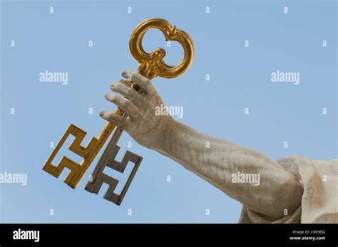 St. Peter holding the Keys of Heaven, detail, hand with 2 keys, in front of Salzburg Cathedral ...