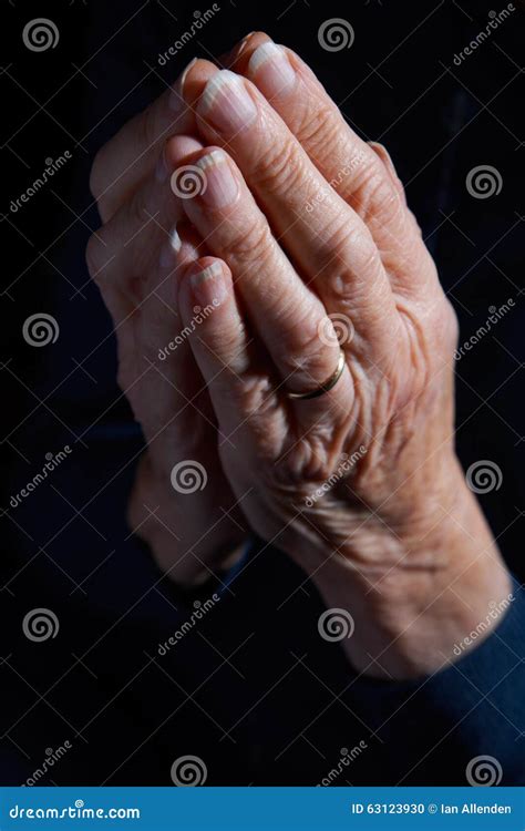 Senior Woman S Hands Clasped In Prayer Stock Photo Image Of