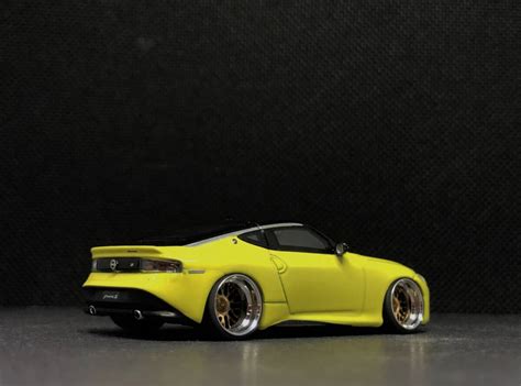 TSMモデル 1 64 Nissan Fairlady Z Proto Spec 2023 Ikazuchi Yellow RHD 改 深リム