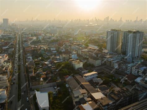 Premium Photo | Aerial view of Bangkok downtown Cars on traffic road ...