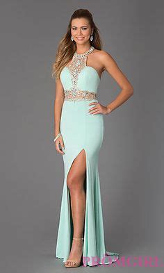 Stand Out In Any Crowd In This Fabulous Beaded Halter Prom Gown From