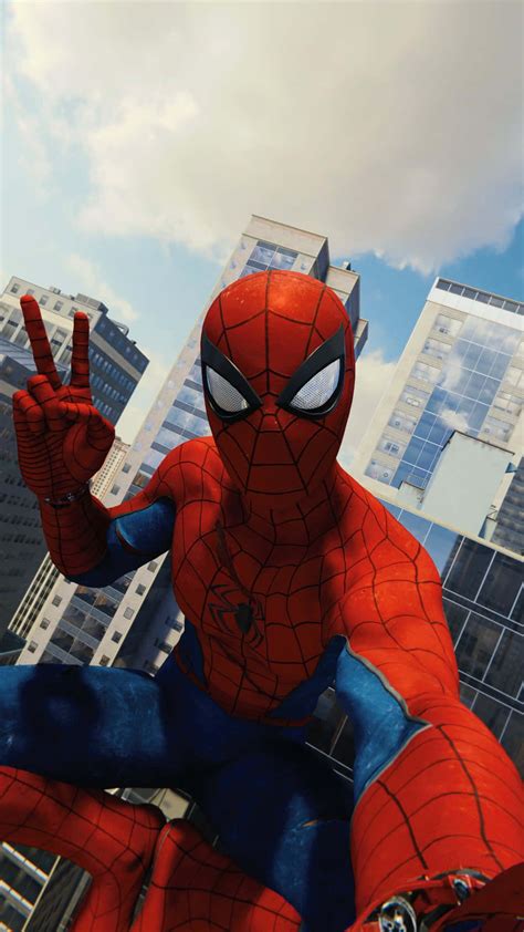 Download Spidey Selfie Man Peace Sign Pose Wallpaper | Wallpapers.com