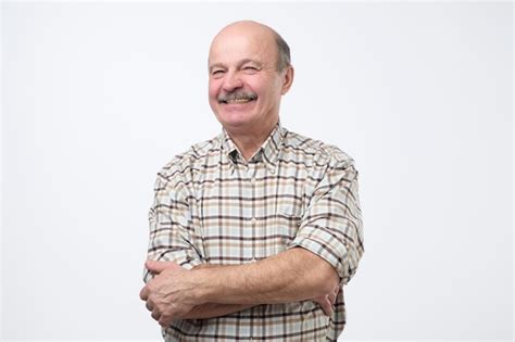 Premium Photo Portrait Of Confident Mature Man In Shirt Looking At