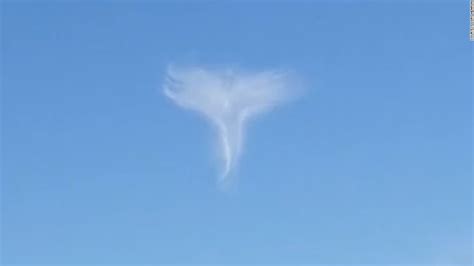 A clip of a cloud shaped like an angel is - CNN