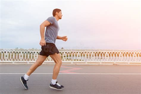 Jogging Lifestyle Young Attractive Man Running Outdoors Stock Photo