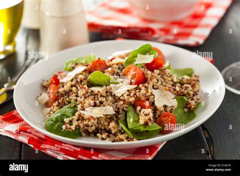 Healthy Vegetarian Quinoa Salad With Tomatoes And Spinach Stock Photo