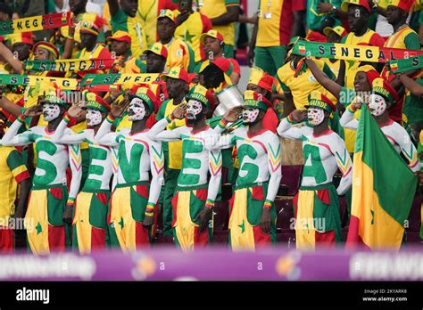 November 29, 2022: Senegal supporters sing the national anthem before ...