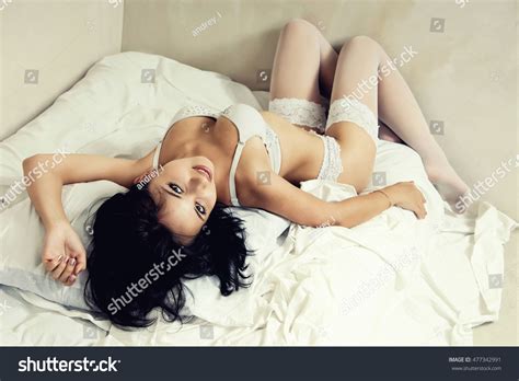 Sexy Woman White Lingerie Lying Bed Stock Photo Edit Now 477342991