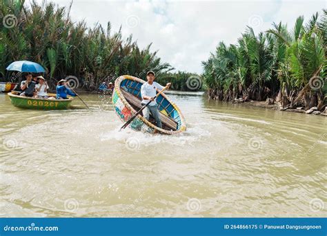 Fisherman Showing Spinning On Basket Boat Is A Unique Vietnamese At