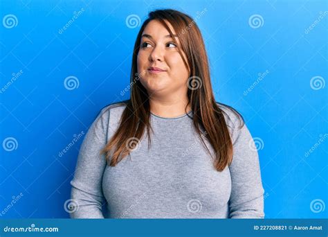 Beautiful Brunette Plus Size Woman Wearing Casual Clothes Smiling