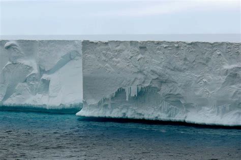 Meltwater may fracture Antarctic ice shelves and speed sea level rise | New Scientist