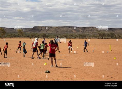 Kids Play On The Town Oval In The Santa Teresa Aboriginal Community 80