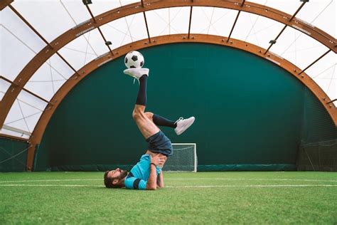 Premium Photo | Cinematic image of a soccer freestyle player making ...