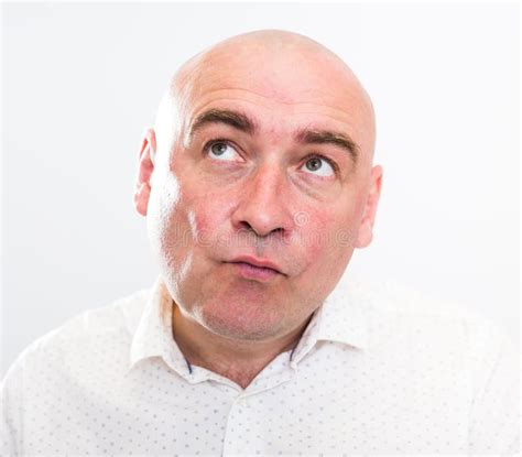 Portrait Of Bald Adult Mature Man With Emotions On White Background