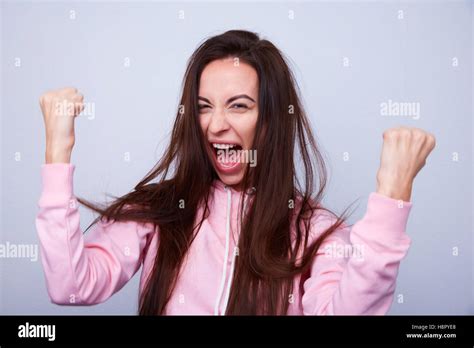 Beautiful Brunette Is Happy Rising Fists Stock Photo Alamy