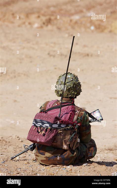 Afghan National Army Soldier During Combat Operation Outside Town