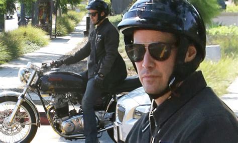 Keanu Reeves wheels around Beverly Hills on motorcycle | Daily Mail Online