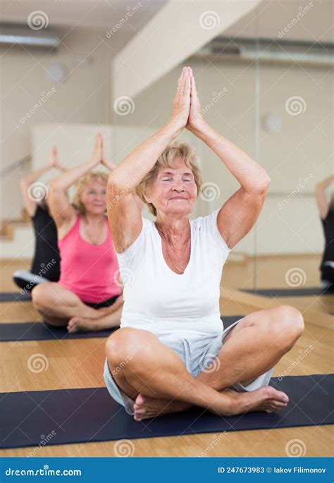 Senior Women Sitting In Lotus Pose During Group Training Stock Image Image Of Exercise