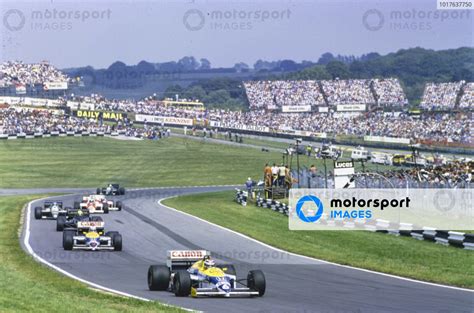 Nelson Piquet Williams FW11 Honda Leads Nigel Mansell Williams FW11