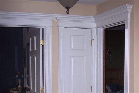 Integrate Window And Door Trim With Wainscoting Panels