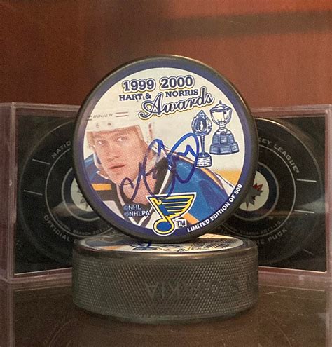 Autographed Chris Pronger 1999 2000 Hart And Norris Award Puck Nikco