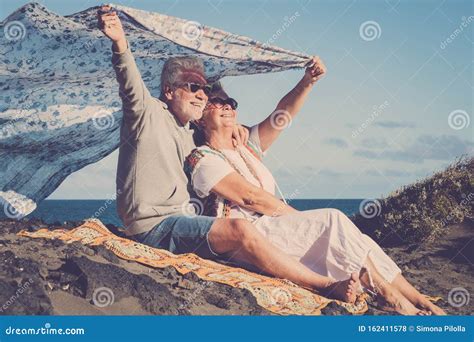 Happy Senior Caucasian Couple Enjoy The Outdoor Leisure Activity